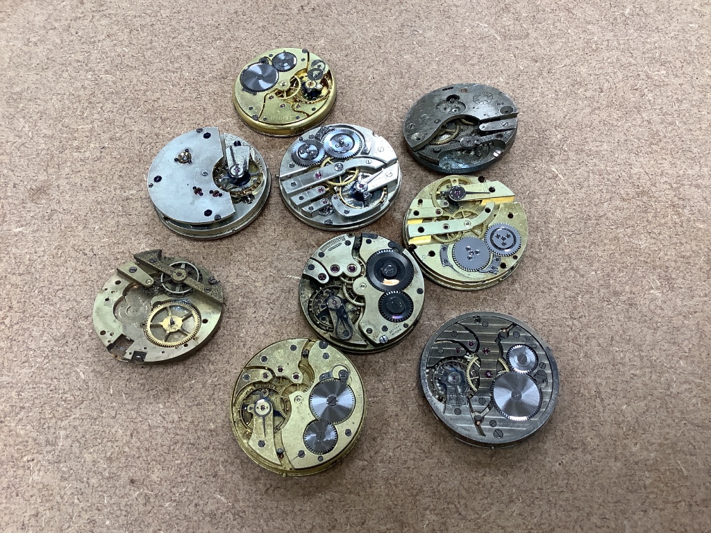 A large quantity of assorted pocket watch movements accessories and parts, etc.